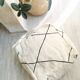 Black and white Berber ottoman cover with diamonds