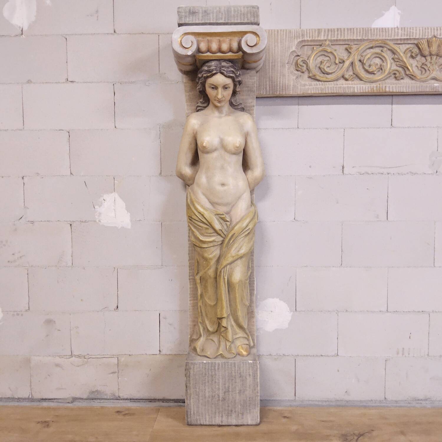 Neoclassical plaster fireplace with caryatids (nude women)