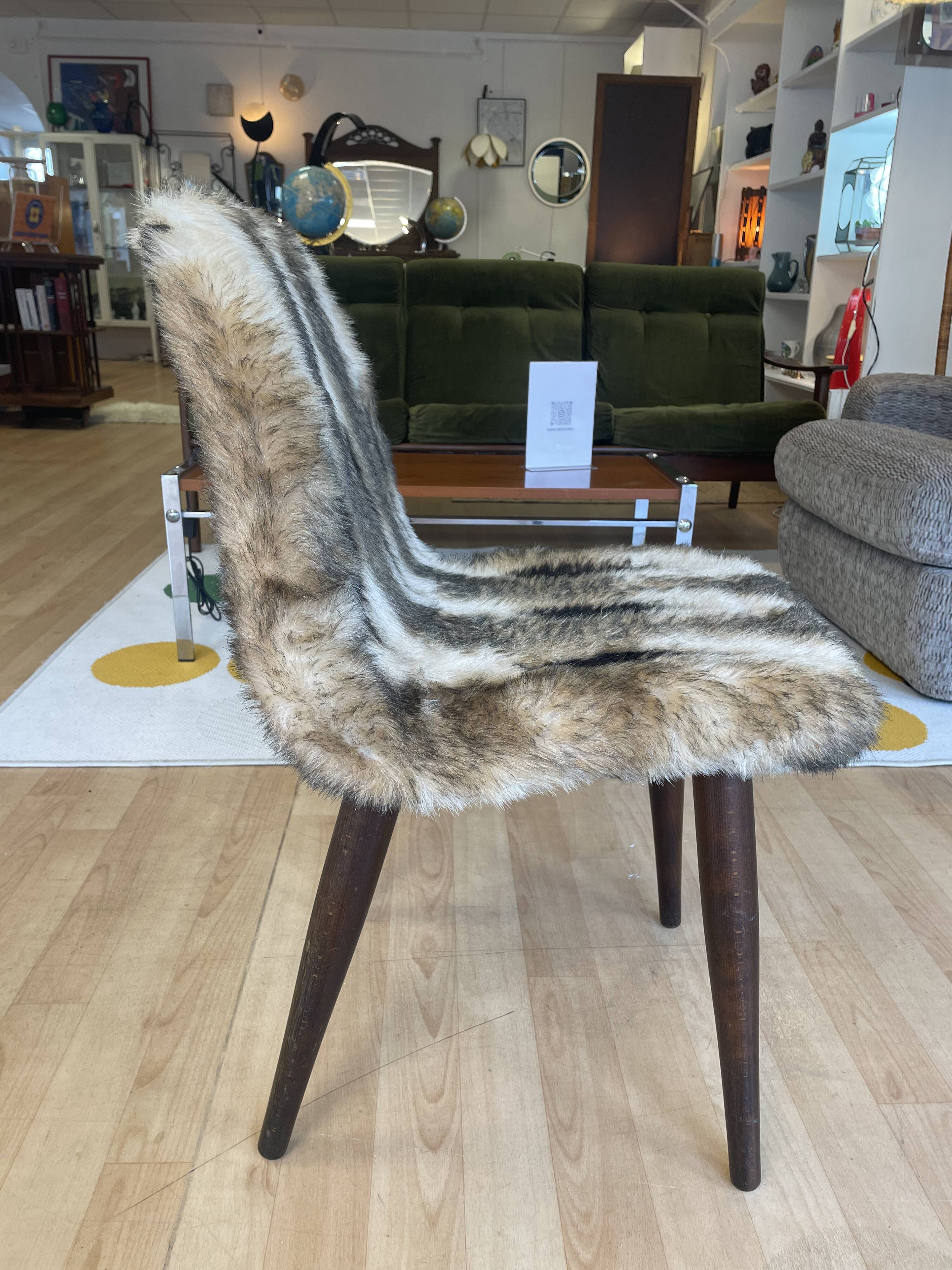 Faux fur chair with patterns & tapered dark wood legs