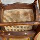 Set of 4 Louis-Philippe medallion chairs in wood with caned seats, 1970s.