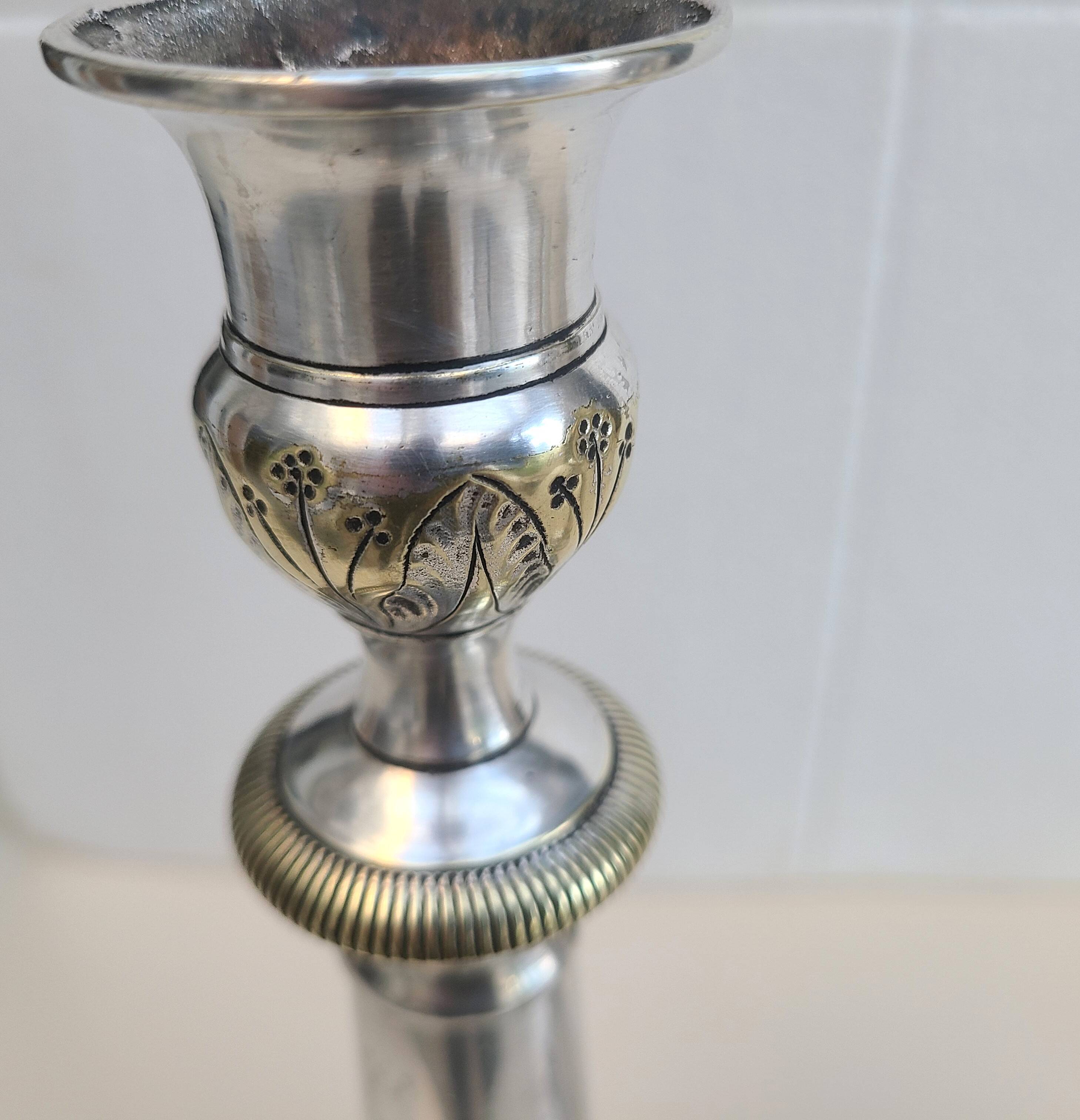 Antique silver-plated metal candlesticks