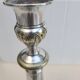 Antique silver-plated metal candlesticks