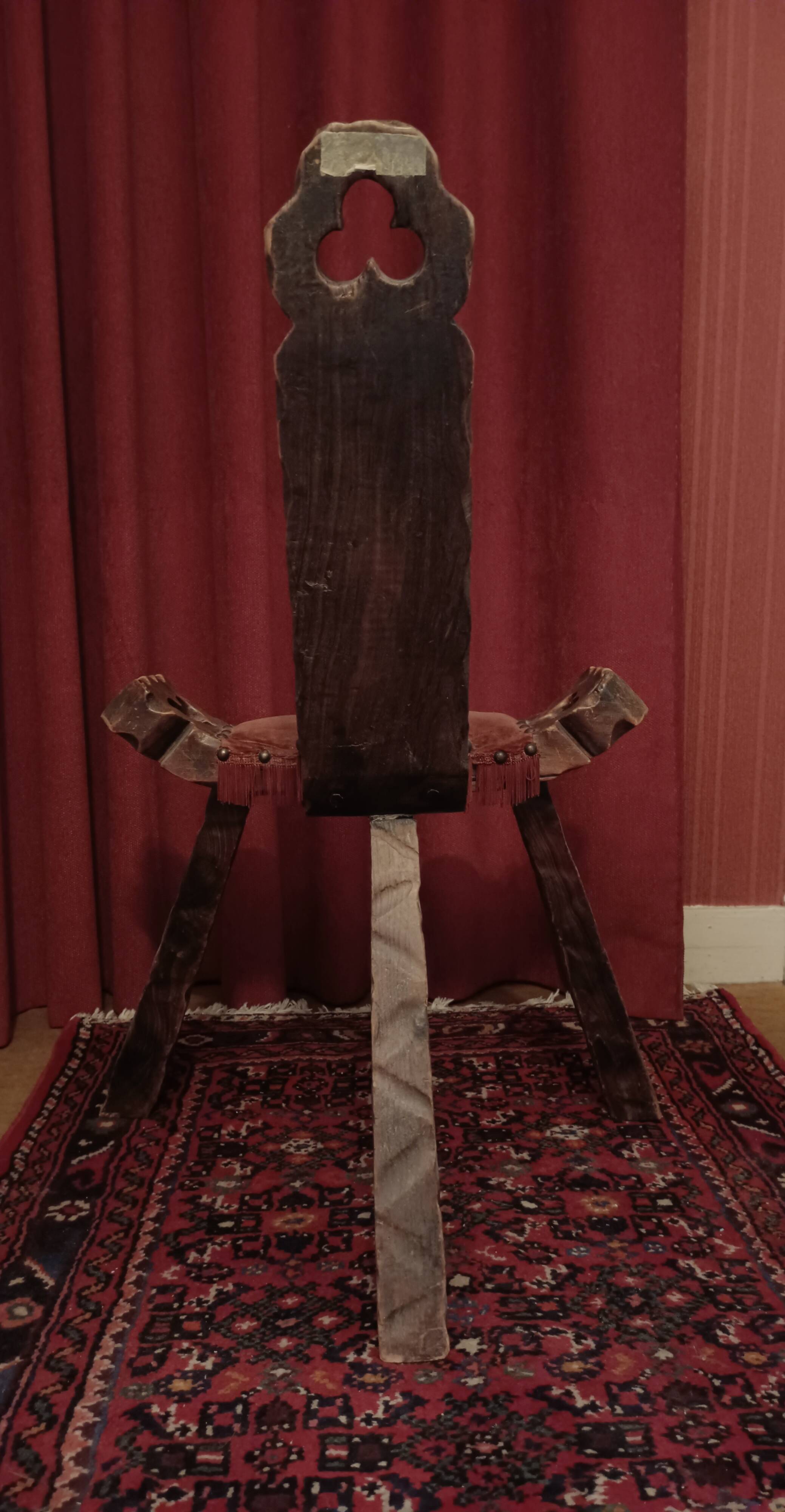 Brutalist chair with tripod legs