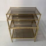 Set of three nesting tables in brass and smoked glass, 20th century