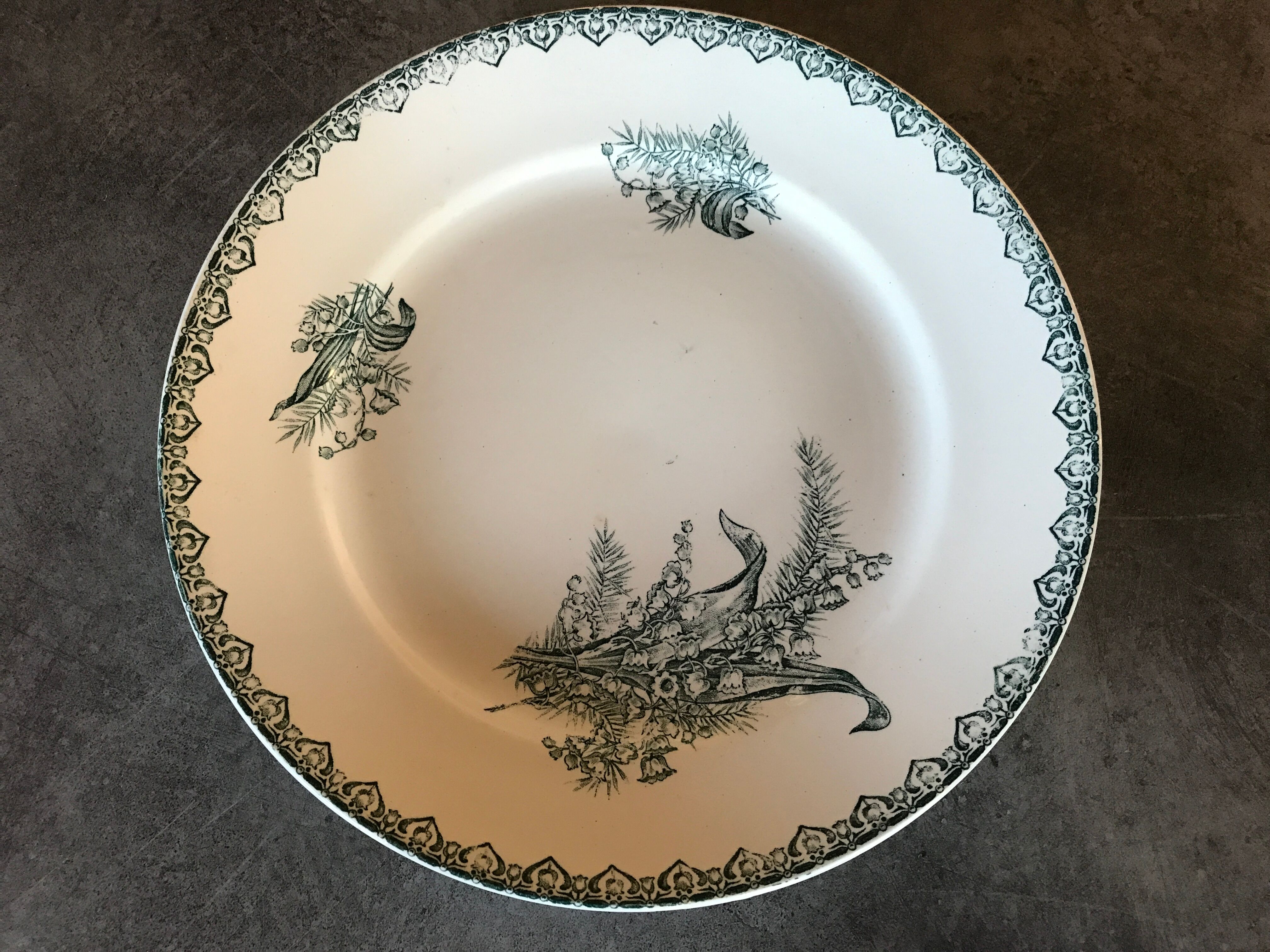 Flat hollow in earthenware st amandinoise st amand model lily of the valley