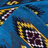 Romanian handwoven carpet with blue ground and yellow details