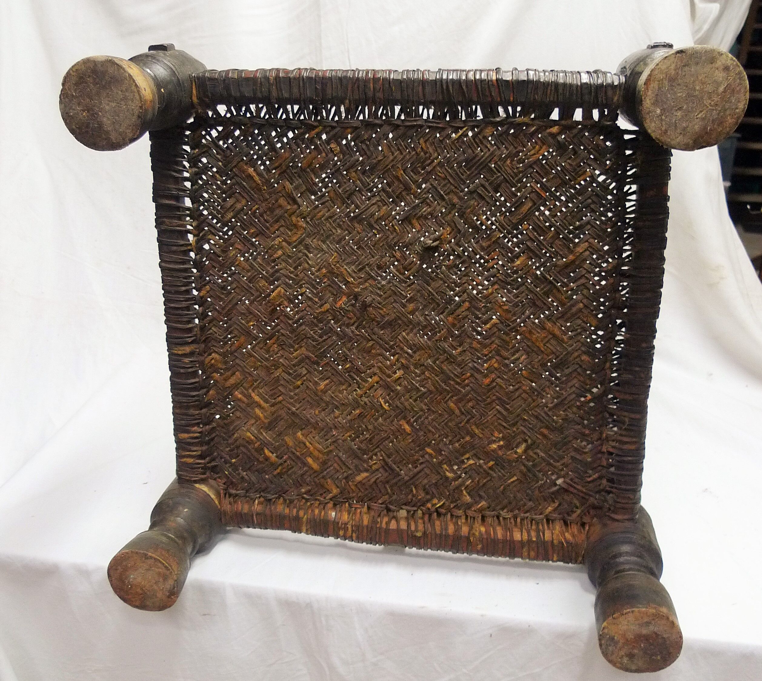 Traditional low chair in wood and leather