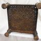 Traditional low chair in wood and leather