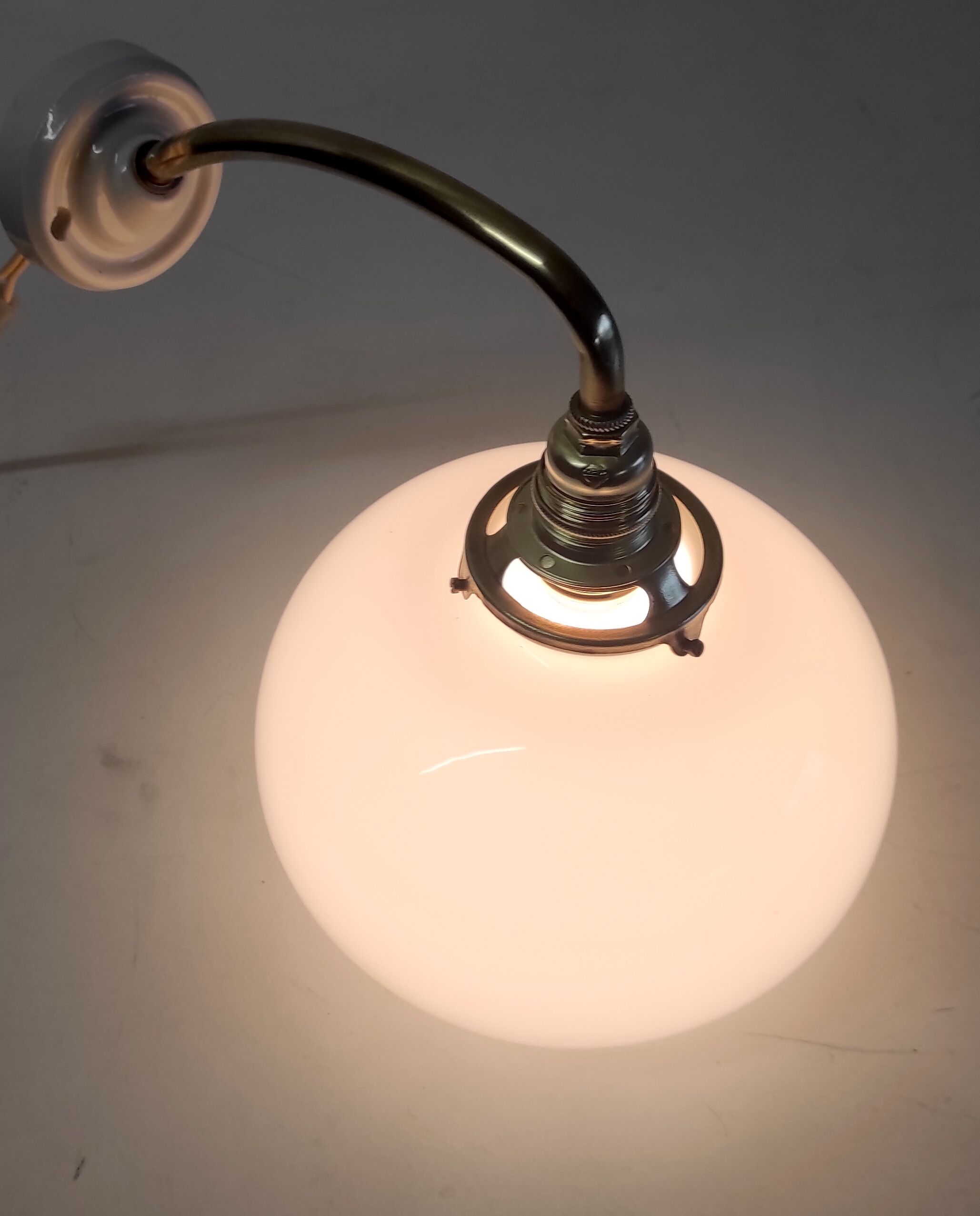 Brass and opaline gooseneck wall lamp – early twentieth century