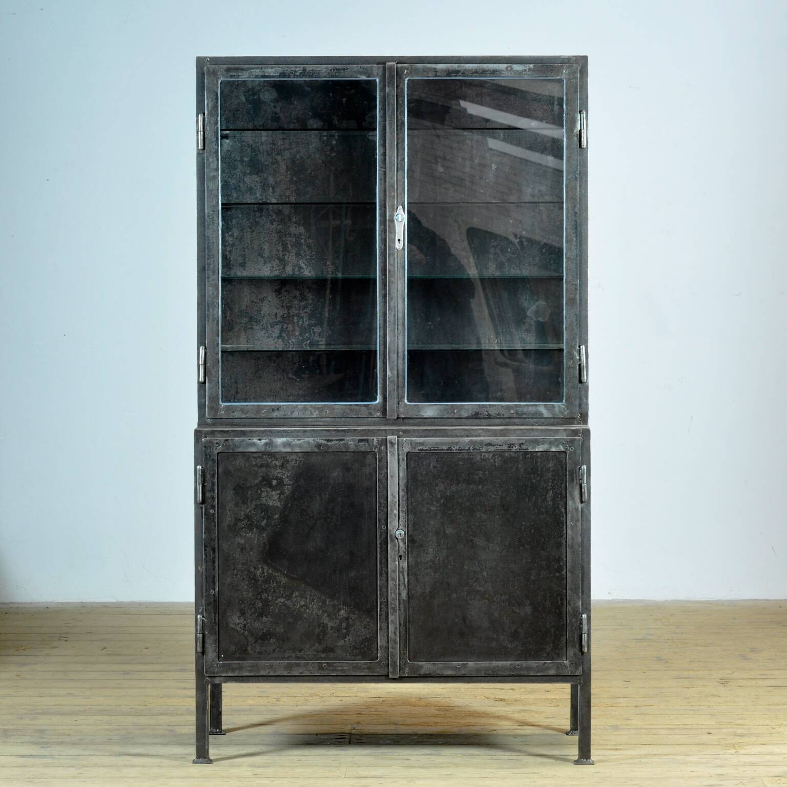 Polished iron medicine cabinet, 1930s