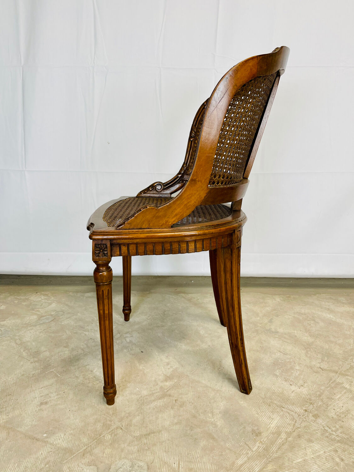 Small cané armchair