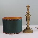 Vintage brass table lamp with green velvet shade.