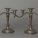 Pair of three-light candlesticks in silver-plated metal