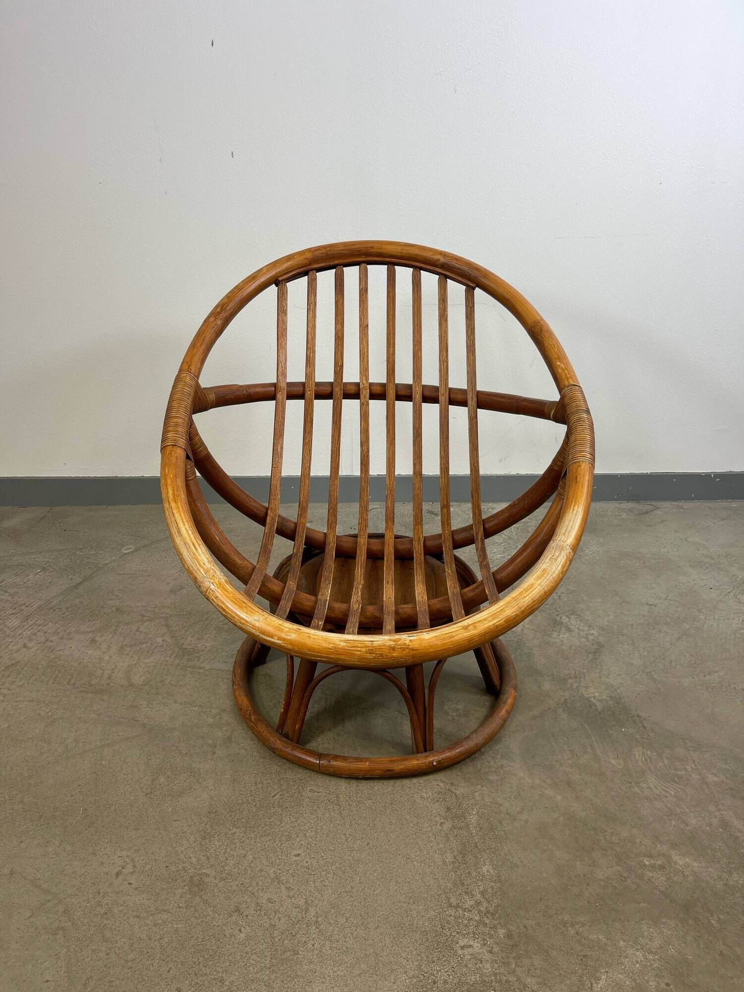 Vintage rattan swivel saucer armchair from the 70s