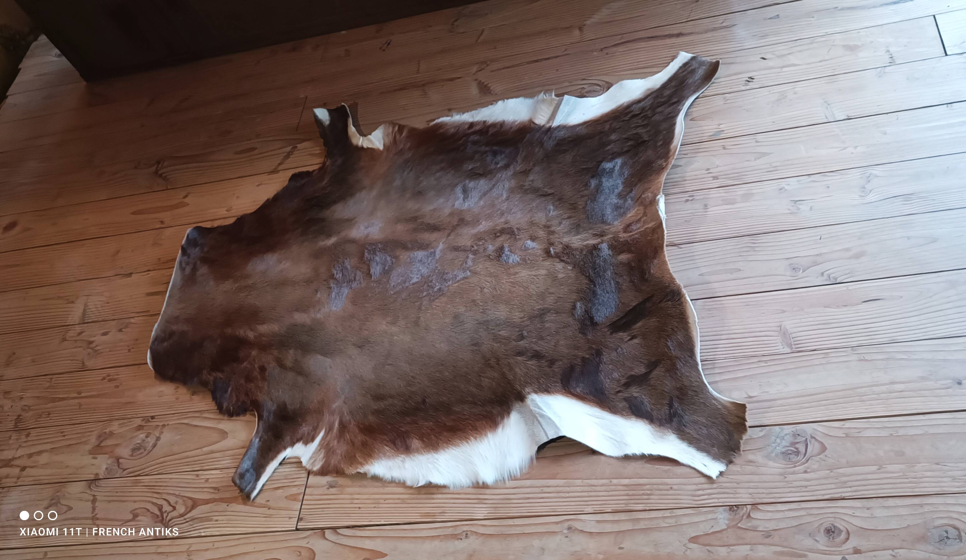 Cowhide rug, vintage from the 1980s. Handmade, made by me.