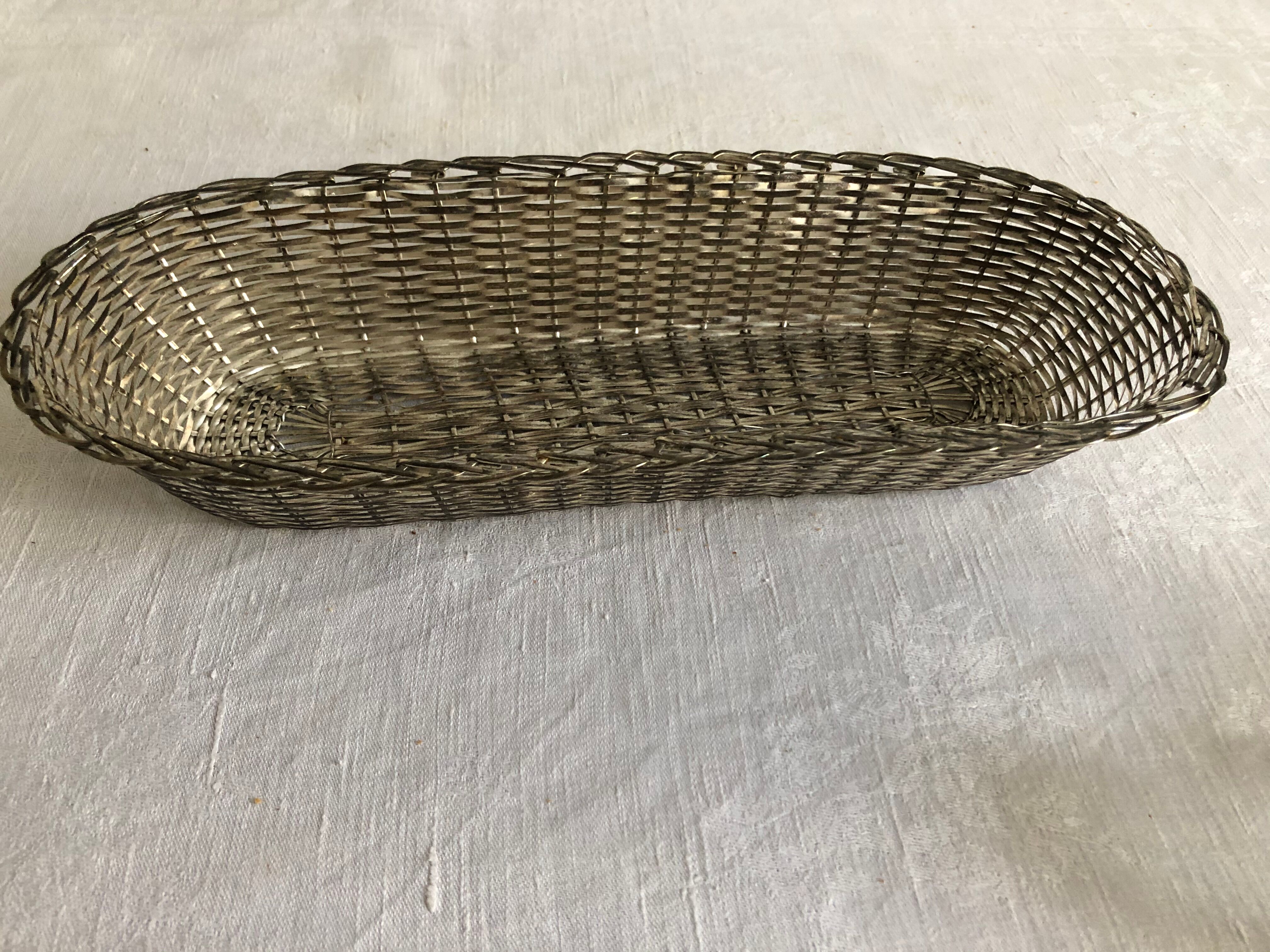 Braided silver metal bread basket