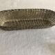 Braided silver metal bread basket
