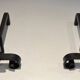 Pair of Wrought Iron Andirons with Obelisk and Belt Motifs