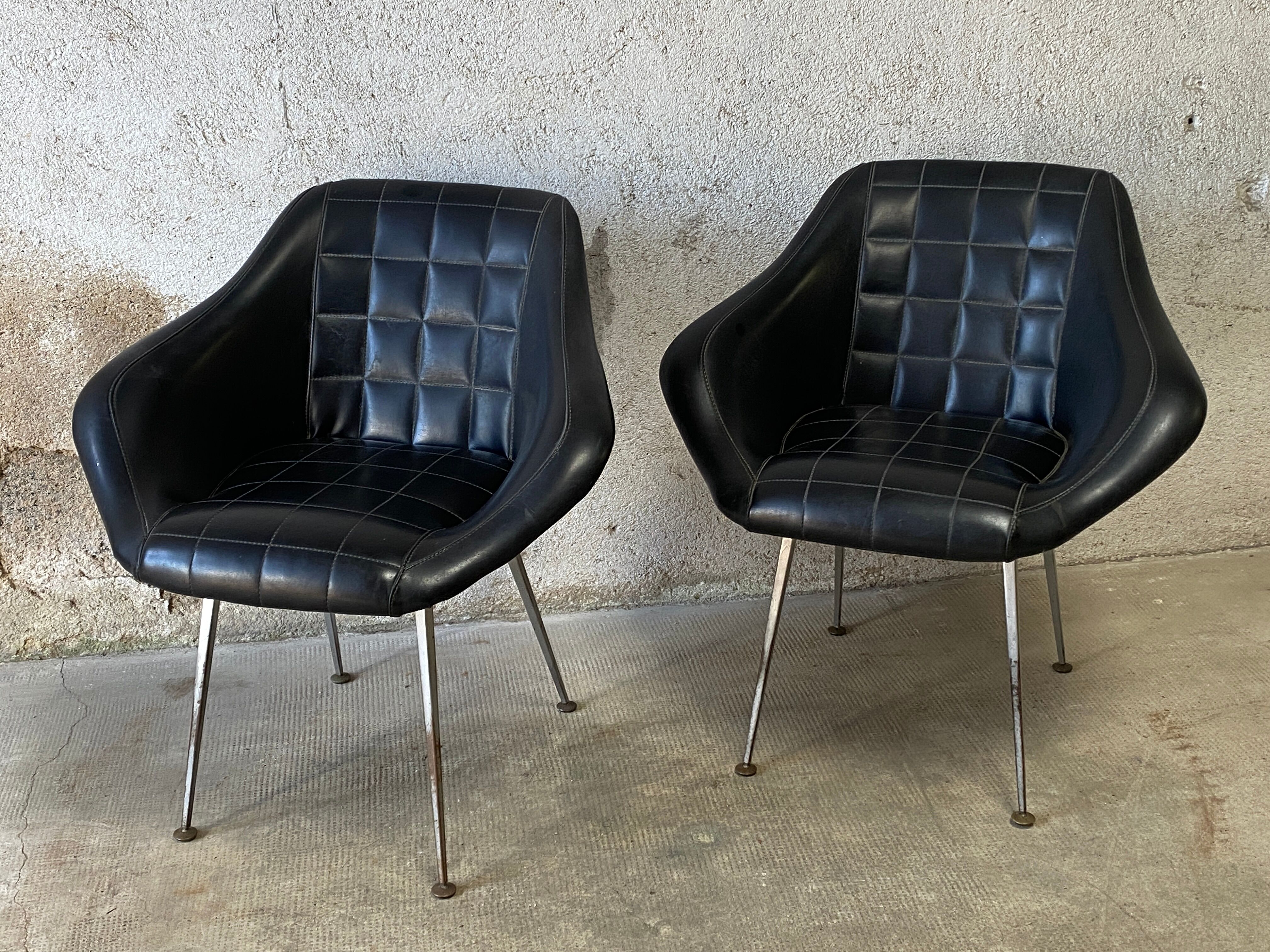 Pair of upholstered armchair year 60