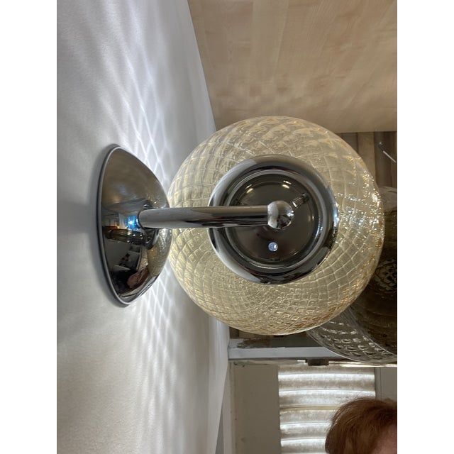 Contemporary "ballotton" amber murano glass wall sconce