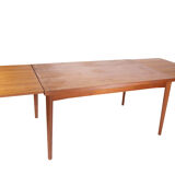 Dining table in teak with extension plates, of Danish design, 1960s
