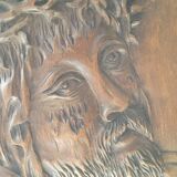 Face of Christ carved on wood