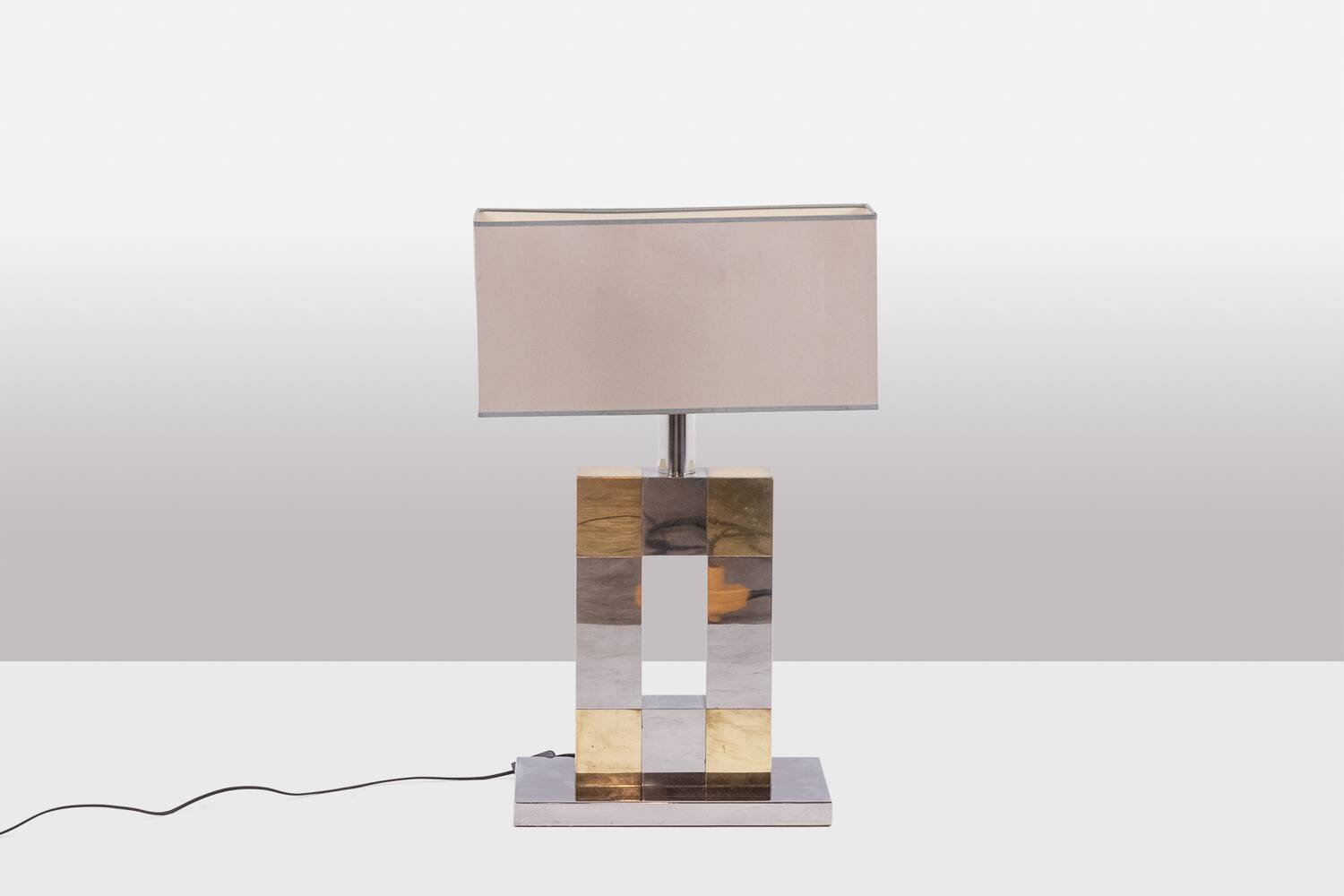 Sandro Petti. Geometric lamp in silvered and gilded metal. 1970s.