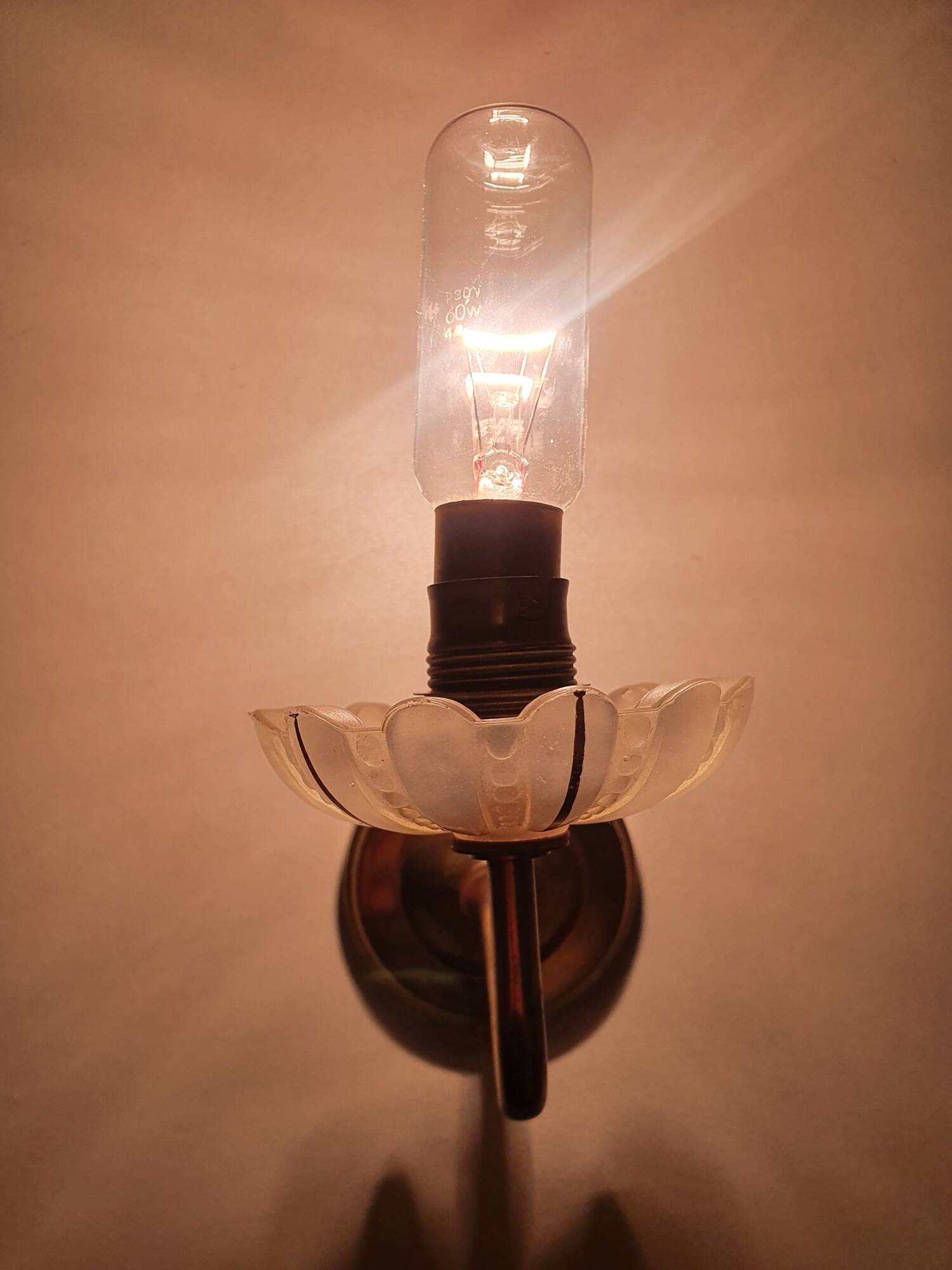 Pair of antique gold candlestick wall sconces