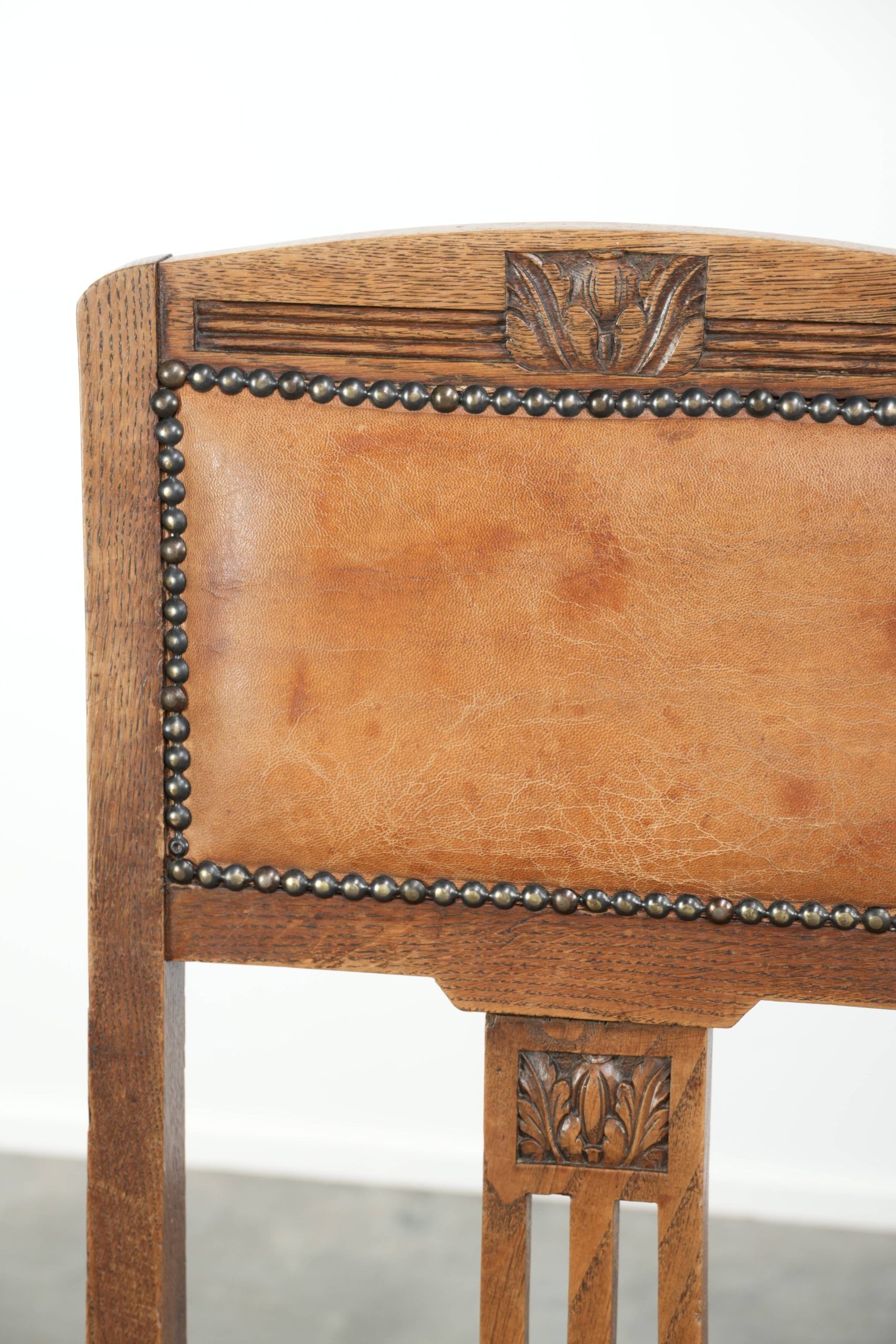 Set of 4 antique oak dining chairs in Art Nouveau style with sheepskin