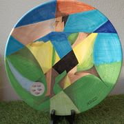 Osvaldo Perruzzi designer of polychrome faience plates.