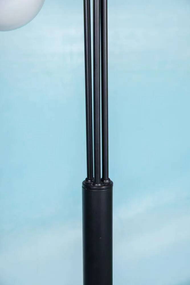 Minimalist floor lamp in glass, space age style.