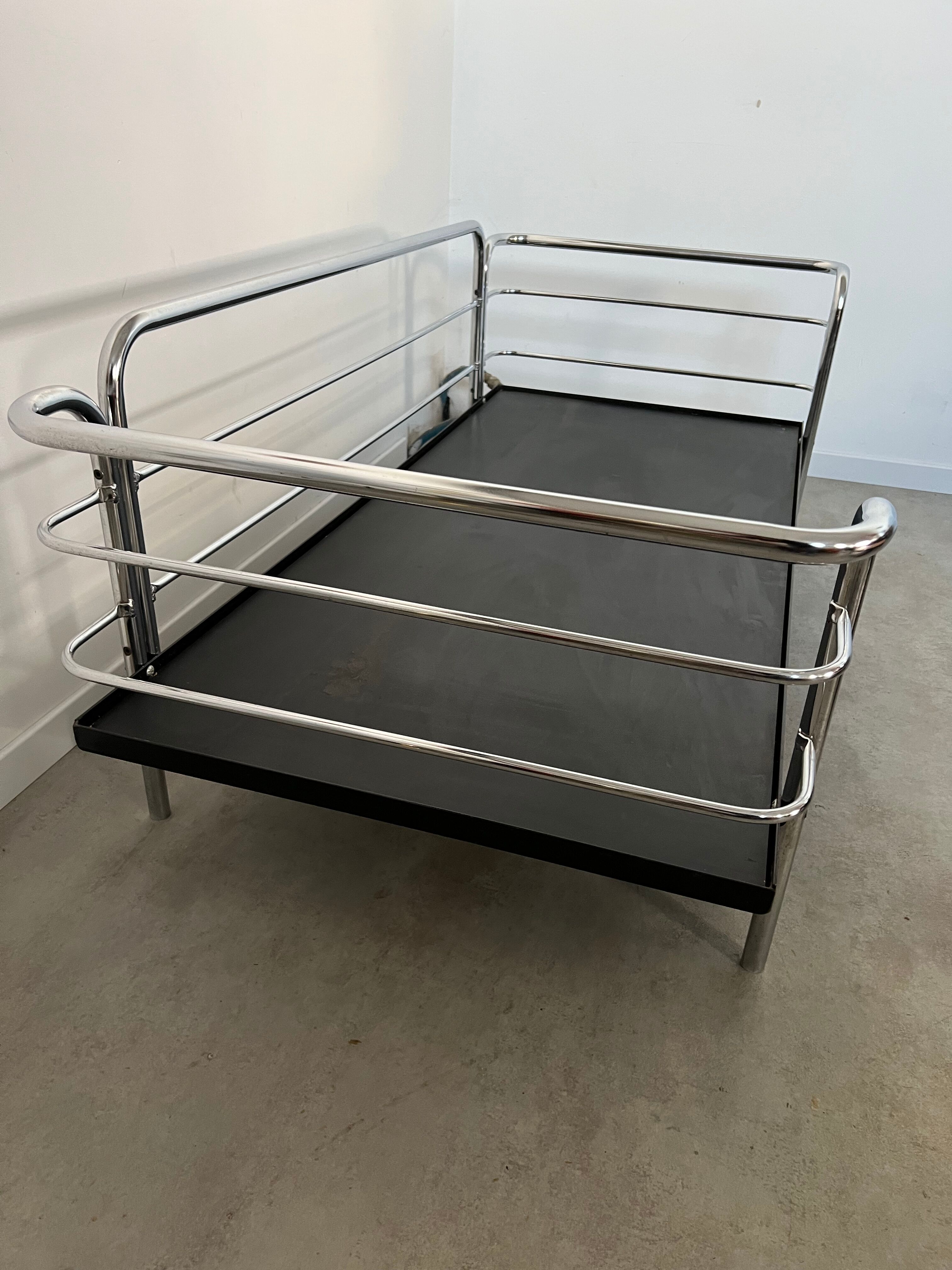 Old vintage leather and tubular metal sofa, design 70s