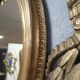 Oval mirror in gilded wood 93x73cm