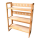 Folding bookshelf in light wood.