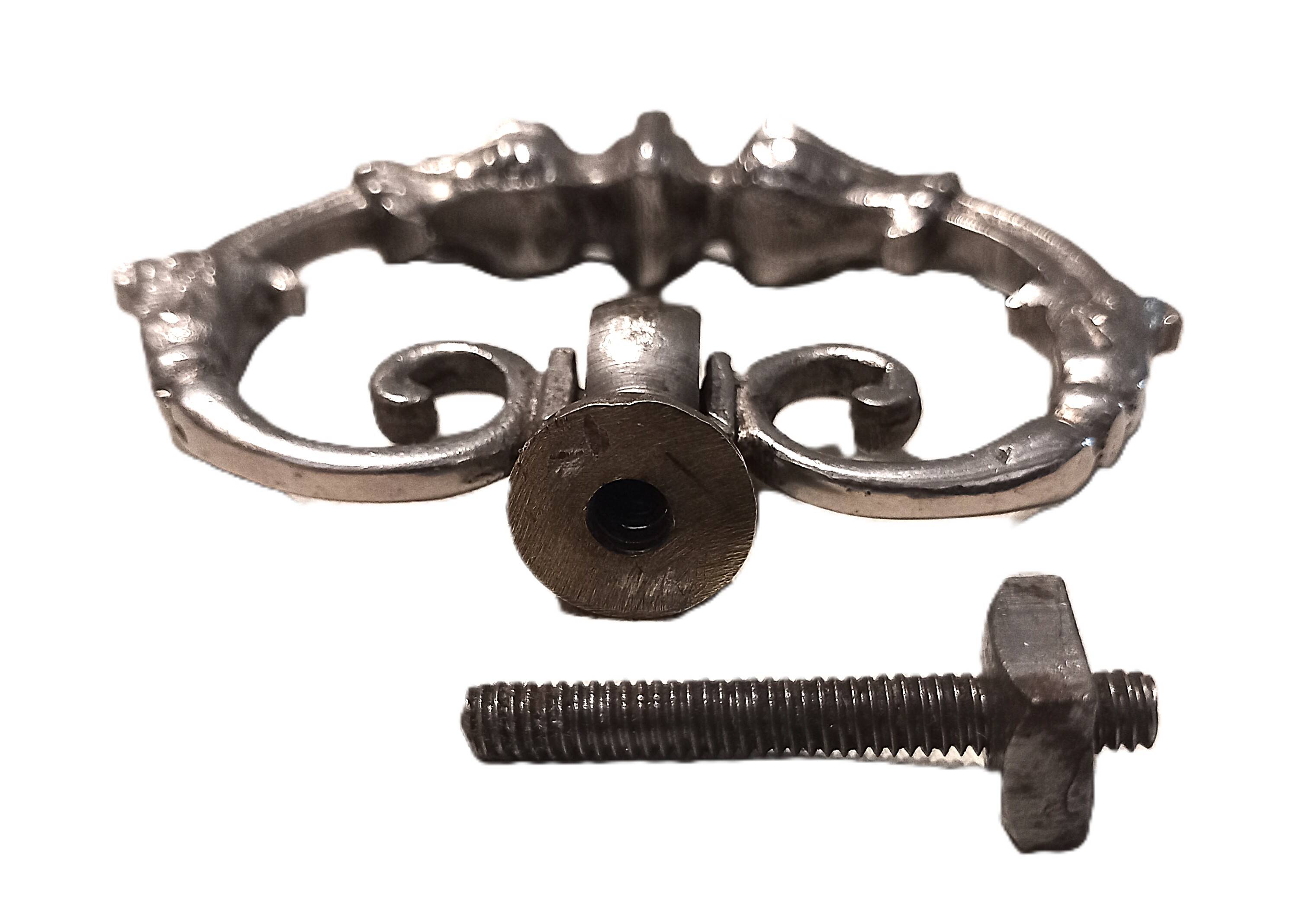 Old silver-plated metal furniture handle