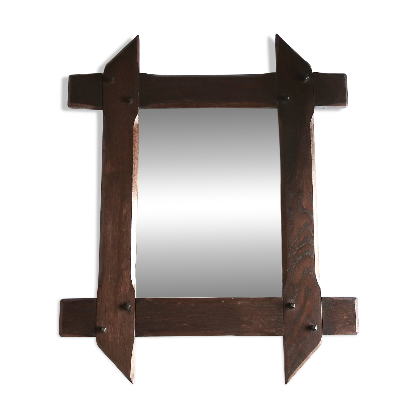 Rectangular mirror with bevelled wooden frame, 1970s.