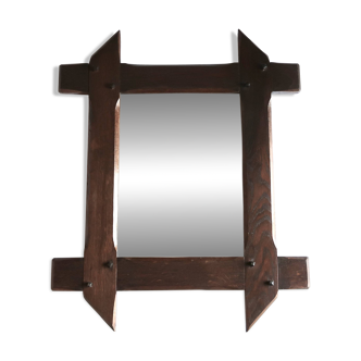 Rectangular mirror with bevelled wooden frame, 1970s.