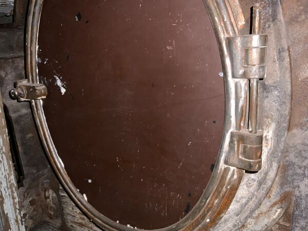 Miroir œuil de bœuf en fonte XIXème - 102cm