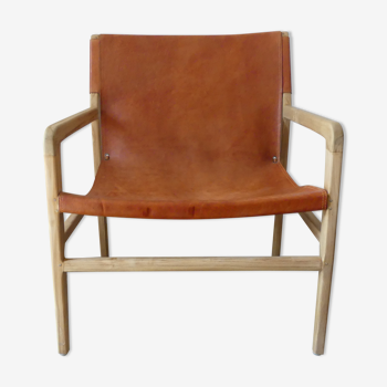 Fauteuil havana en teck et cuir de vachette