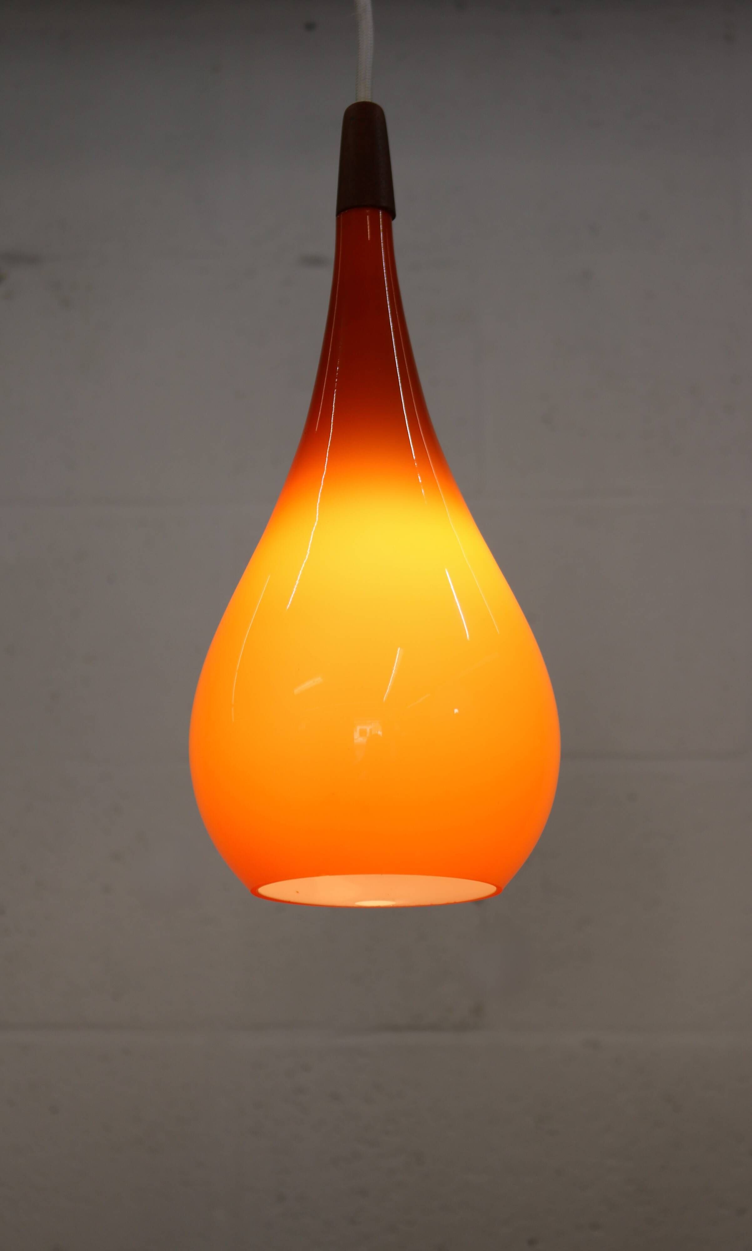 Orange teardrop glass pendant lamp made by Holmegaard - Denmark 1960