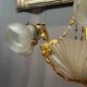 Golden bronze chandelier in Louis XVI style. 12 light points.