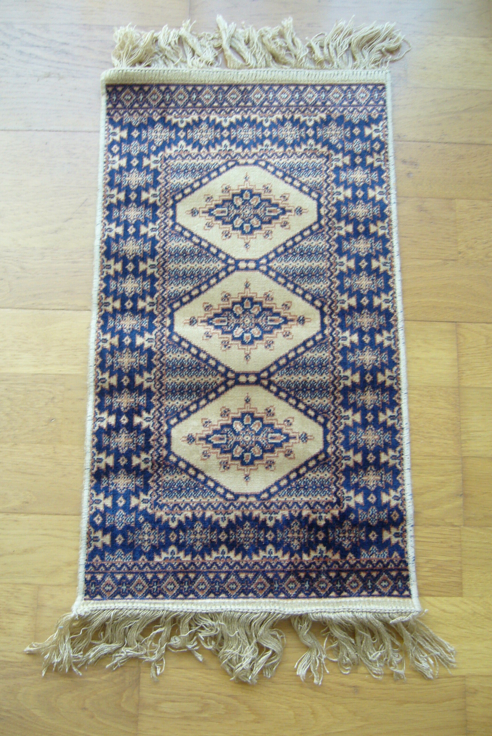 Three oriental rugs 35 x 70 cm