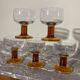 Amber stemmed glass