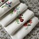 7 antique and embroidered napkins