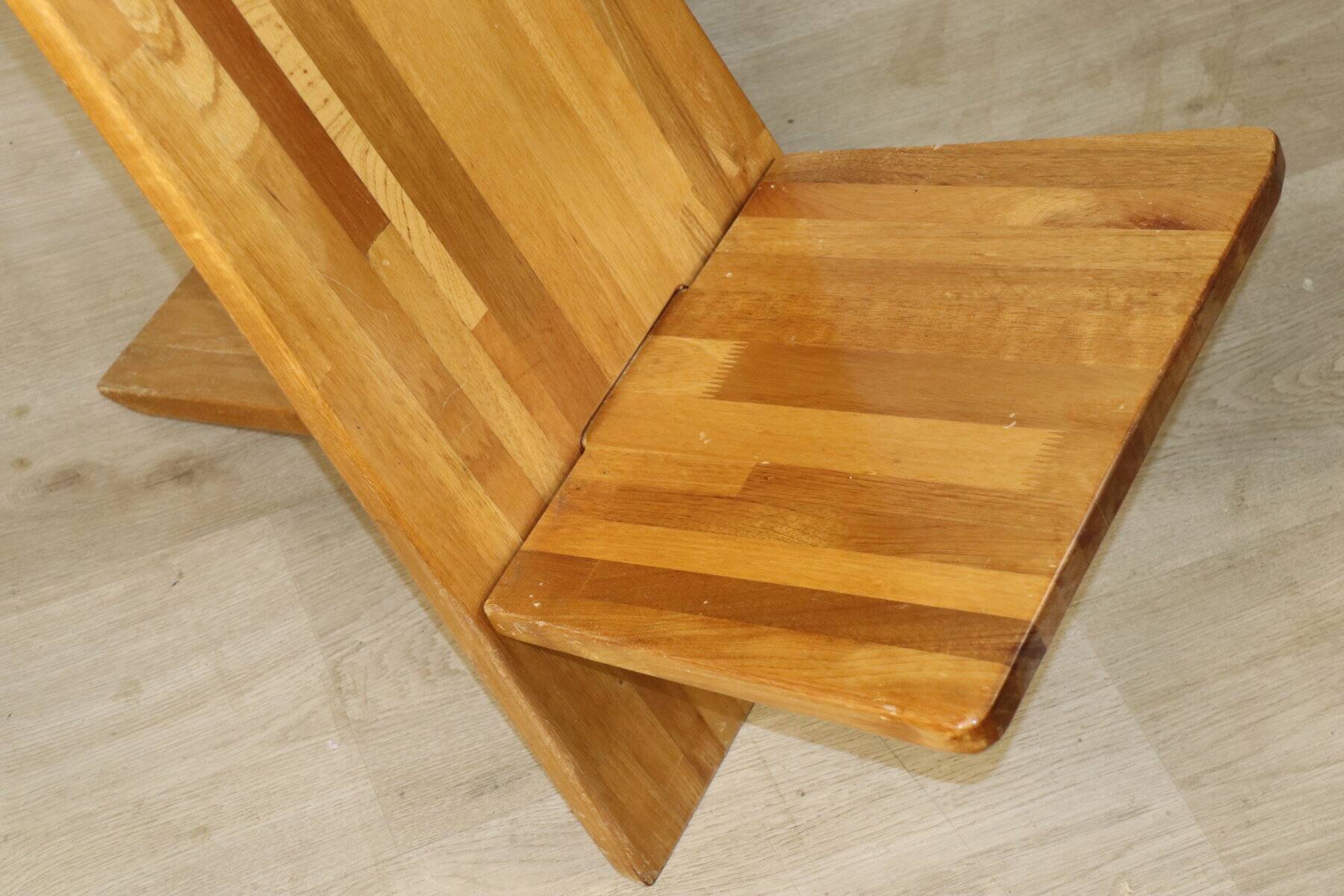 Sculptural brutalist armchair in solid elm, 1980.