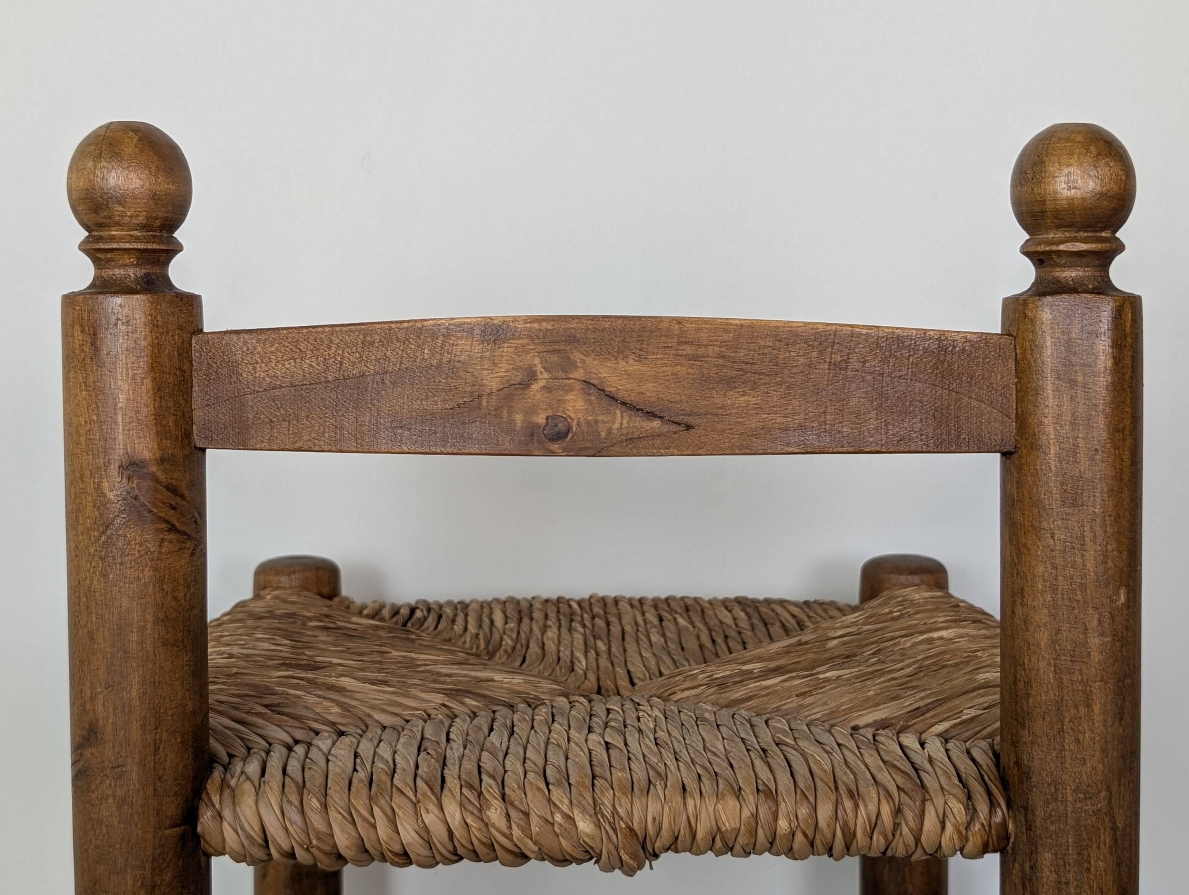 High wooden and straw stools