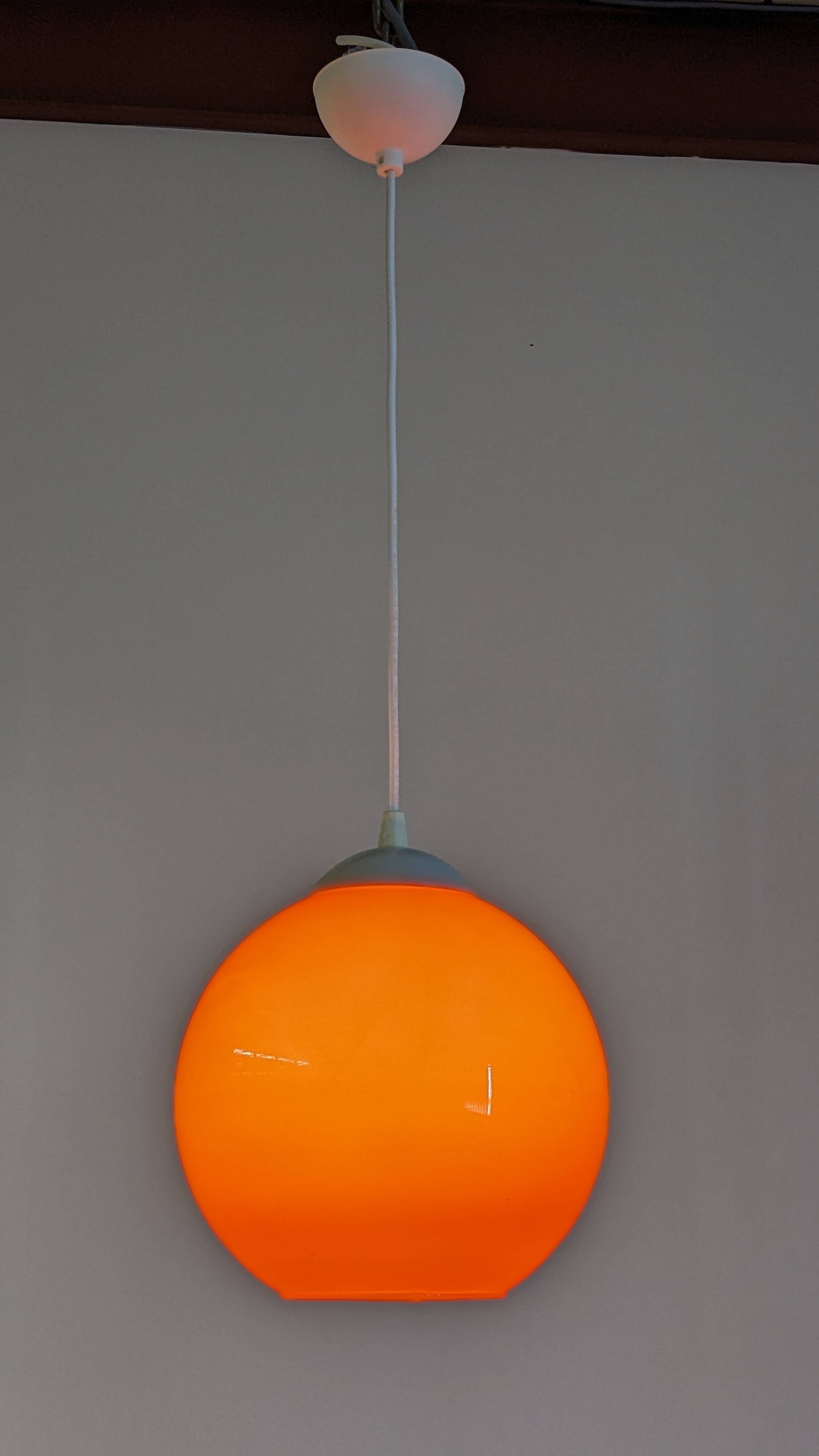 Orange opaline ball pendant, France circa 1970.