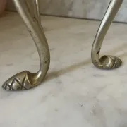 Pair of Victorian brass fire dogs from the late 19th century.