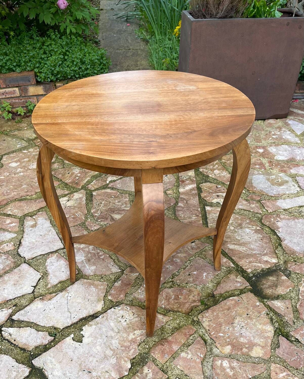 Old wooden pedestal table