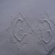 A pair of pillowcases monogrammed CD